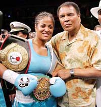 Super middleweight champion Laila Ali  with her father, boxing great Muhammad Ali, after her win against Erin Toughill at the MCI Centre in Washington on Saturday