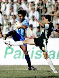 India�s Clifford Miranda fights for the ball with Pakistan�s Abdul Aziz during the first encounter of the three-match series at the Ayub Stadium in Quetta on Sunday