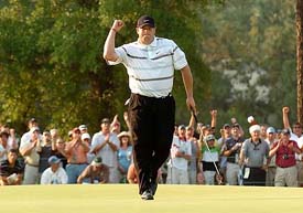 Jason Gore celebrates after sinking a birdie putt on the18th hole in the third round of the 105th US Open golf tournament in Pinehurst, North Carolina