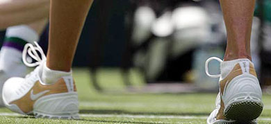 The shoes of defending champion Maria Sharapova of Russia, reportedly decorated with diamonds, are seen during her first round match