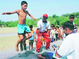 Young boys undergo tests during a rally for selection to the Pune-based Army Sports Institute in Chandimandir