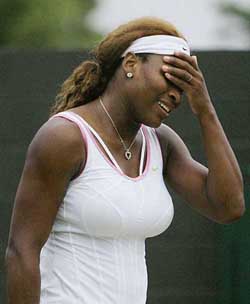 Serena Williams gestures during her third round match against fellow American Jill Craybas at Wimbledon on Saturday