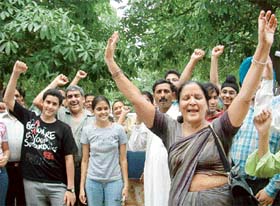 PMET candidates and their parents protest in front of the administrative block of Guru Nanak Dev University in Amritsar