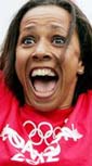 Britain’s Kelly Holmes reacts to the announcement that London will host the 2012 Olympics