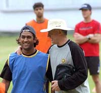Coach Greg Chappell  with M.S. Dhoni during the conditioning camp for cricketers in Bangalore