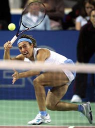 Francesca Schiavone of Italy returns the ball to Kveta Peschke of the Czech Republic during their Fed Cup match at Liberec in the Czech Republic on Saturday