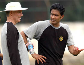 Indian leg spinner Anil Kumble talks to coach Greg Chappell during the fitness and conditioning camp at the National Cricket Academy in Bangalore on Sunday. 