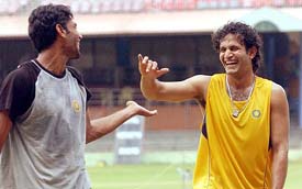 Irfan Pathan shares a joke with Munaf Patel on the concluding day of the fitness and conditioning camp for Indian cricketers in Bangalore on Monday