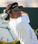 Japan�s Shigeki Maruyama watches the ball after teeing off on the second day of practice for the British Open at St Andrews