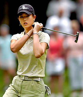 Michelle Wie reacts to a missed putt for par on the seventh green
