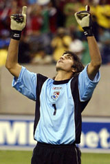 Panama�s goalkeeper Jaime Penedo celebrates after blocking a shot during the penalty shootout in their CONCACAF Gold Cup quarterfinal soccer match against South Africa in Houston