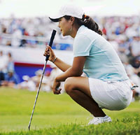 Meena Lee of South Korea lines up her final putt on the 18th hole during the final round of the BMO Canadian Women�s Open at Glen Arbour in Halifax, Nova Scotia