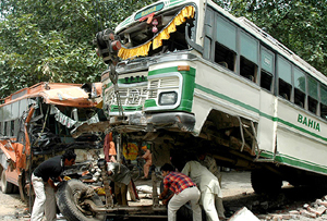Mangled remains of a bus after it collided with another bus near Kailevandar village of Bathinda on Friday.