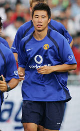 Manchester United�s Chinese soccer player Dong Fangzhuo takes part in a training session in Hong Kong