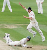 England�s Kevin Pietersen celebrates after running out Australian batsman Justin Langer on the second day of the first Test at Lord�s