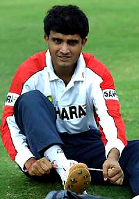 Sourav Ganguly ties his shoelaces during a practice session at Dambulla in Sri Lanka on Monday