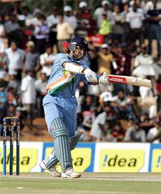 Sourav Ganguly hits a boundary on way to his 51 runs against Sri Lanka during the triangular one-day cricket tournament at Rangiri Dambulu Cricket Stadium in Dambulla