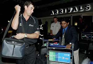 New Zealand captain Stephen Fleming arrives at the Harare airport on Tuesday. 