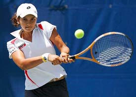 Sania Mirza hits a backhand to Japan�s Akiko Morigami during their third round match at the Acura Classic in Carlsbad, California, on Thursday