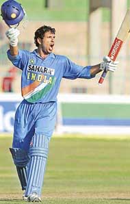 Yuvraj Singh celebrates his century against the West Indies during the final group match of the triangular series in Colombo on Sunday. India won by 7 runs.