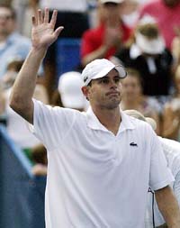 Andy Roddick of the US waves to crowd