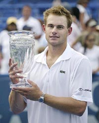 Andy Roddick holds the Legg Mason Classic trophy after beating James Blake 7-5, 6-3 in the final in Washington on Sunday