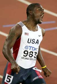 Justin Gatlin of the USA celebrates after winning the men's 100 metres final at the World Athletics Championships in Helsinki on Sunday