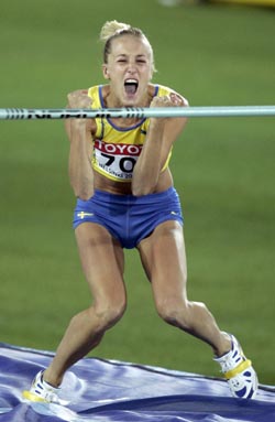 Kajsa Bergqvist of Sweden celebrates after clearing 2.02 metres during the women�s high jump final at the World Athletics Championships in Helsinki on Monday