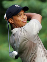 Tiger Woods of the USA tees off from the 10th hole during the first round of the 2005 PGA Championship at Baltusrol Golf Club in Springfield, New Jersey, on Thursday