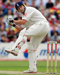 England�s Andrew Flintoff ducks a delivery during the second day of the third Test against Australia at Old Trafford in Manchester on Friday