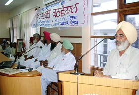 A member of the Marxist Communist Party of India addresses the gathering at a convention in Patiala