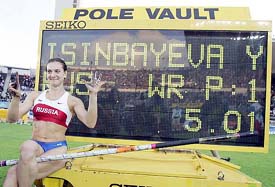 Yelena Isinbayeva of Russia sits near the scoreboard after clearing 5.01 metres to set a new world record during the women�s pole vault final at the World Athletics Championships in Helsinki on Friday