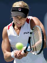 Belgium�s Kim Clijsters hits a backhand during her quarterfinal match against Russia�s Nadia Petrova at the JP Morgan Chase Open in Carson, California