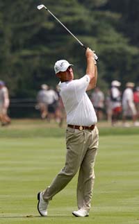 Thomas Bjorn of Denmark hits off the 11th fairway during the third round of the US PGA Championship at Baltusrol Golf Club in Springfield, New Jersey