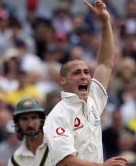 England�s Simon Jones  reacts on trapping Australia�s Jason Gillespie leg before wicket during the fourth day of the third Ashes Test at Old Trafford in Manchester