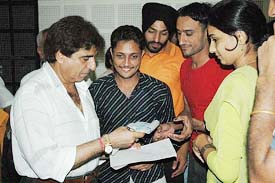 Actor Raj Babbar interacts with students of the Department of Theatre and Television of Punjabi University in Patiala on Wednesday.