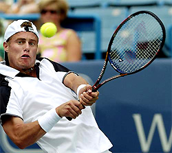 Australia�s Lleyton Hewitt returns a volley to Croatia�s Mario Ancic 