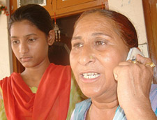 Tears roll down the cheeks of Dalbir Kaur after hearing that her brother Sarbjit Singh will be hanged in Pakistan. On the left is Sapna, daughter of Sarbjit Singh