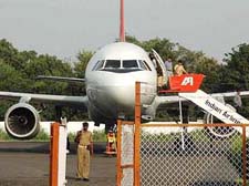 Passengers disembark from the Indian Airlines plane that developed a snag in Chandigarh on Monday