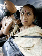 Dalbir Kaur, sister of Sarabjit Singh, an Indian prisoner held in Pakistan, is driven away from the External Affairs Ministry office after a meeting with Mr Natwar Singh in New Delhi on Tuesday