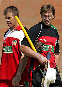 Zimbabwe coach Kevin Curran and vice-captain Heath Streak inspect the pitch during practice at the Queens Sports Club in Bulawayo on Tuesday