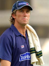 Australia's Glenn McGrath leaves the pitch after being declared unfit for the fourth Ashes Test against England at Trent Bridge