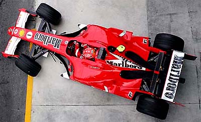 Formula One driver Michael Schumacher of Germany tests the Ferrari F2005 car at the Monza race track near Milan on Thursday