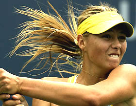 Maria Sharapova of Russia hits a shot during her second-round match against Dally Randriantefy