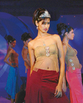 Models showcase a new range of jewellery at the International Gem and Jewellery Exhibition in Mumbai on Saturday evening. 