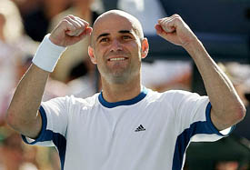 Andre Agassi of the US celebrates his victory over Xavier Malisse of Belgium in the fourth round of the US Open in New York 