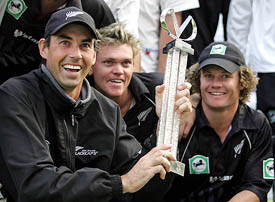 New Zealand captain Stephen Fleming, Lou Vincent and Hamish Marshall pose with the trophy
