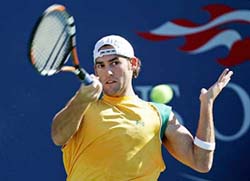 Robby Ginepri of the USA hits a return shot to Guillermo Coria of Argentina in their quarterfinal match at the US Open in New York on Wednesday. 