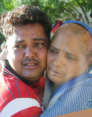 One of the Indian prisoners along with his mother at the Wagah joint checkpost after being released from a Pakistani jail on Monday.