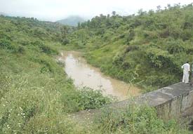 The dam near Samlah village in which only a few feet of water has accumulated despite heavy rains.